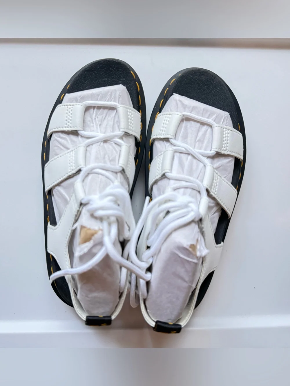 Dr. Martens White Leather Lace-Up Platform Sandals with yellow stitching